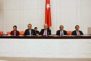 Erciyes (second from left) attended the Turkish parliamentary session during which the MoU was ratified.